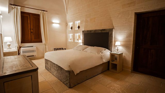 Relax in the Luxurious Negroamaro Suite at Torleanzi Winery