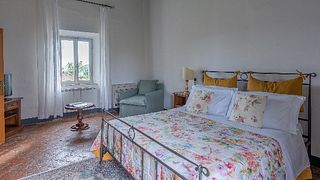Quarto triplo "clássico" em Borgo perto de Castello di Meleto